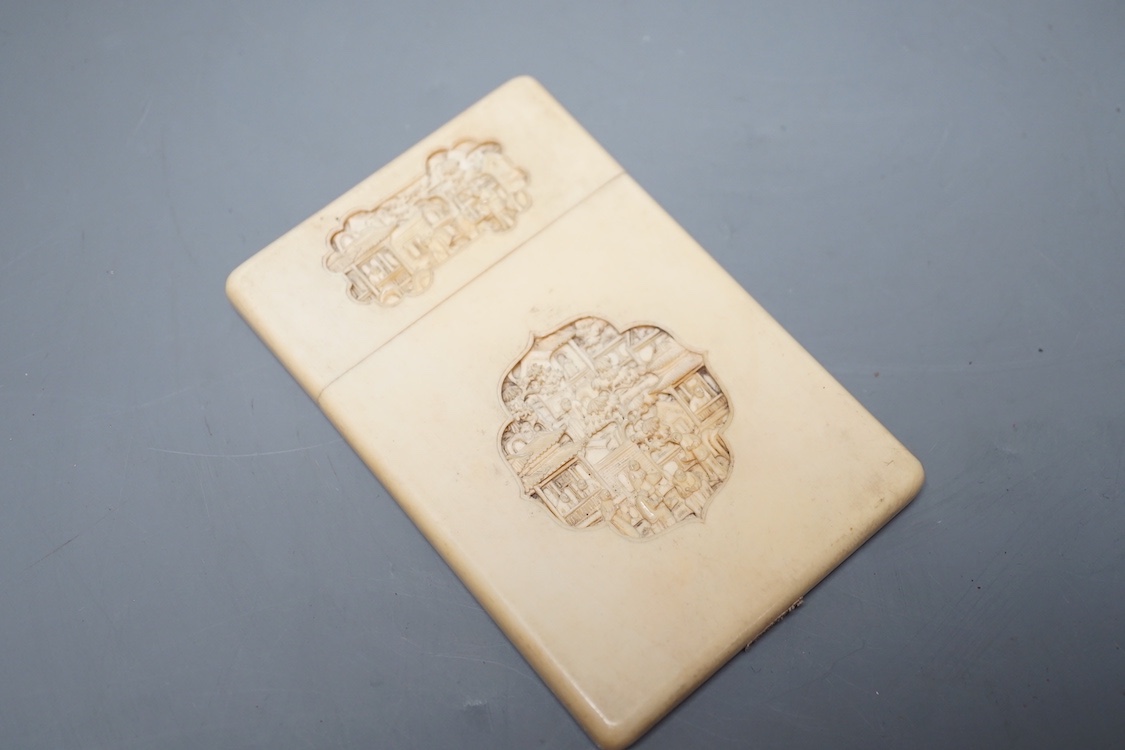 A 19th century Chinese Export ivory card case, 11.5 cms high x 7.5 cms wide.